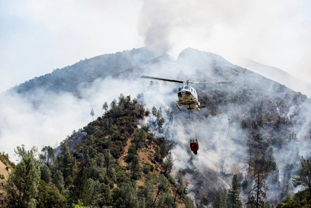 Photo of helicopters battling the Ferguson Fire