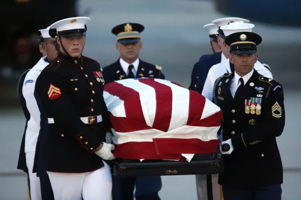 Photo of Armed Forces carrying John McCain's flag-draped casket