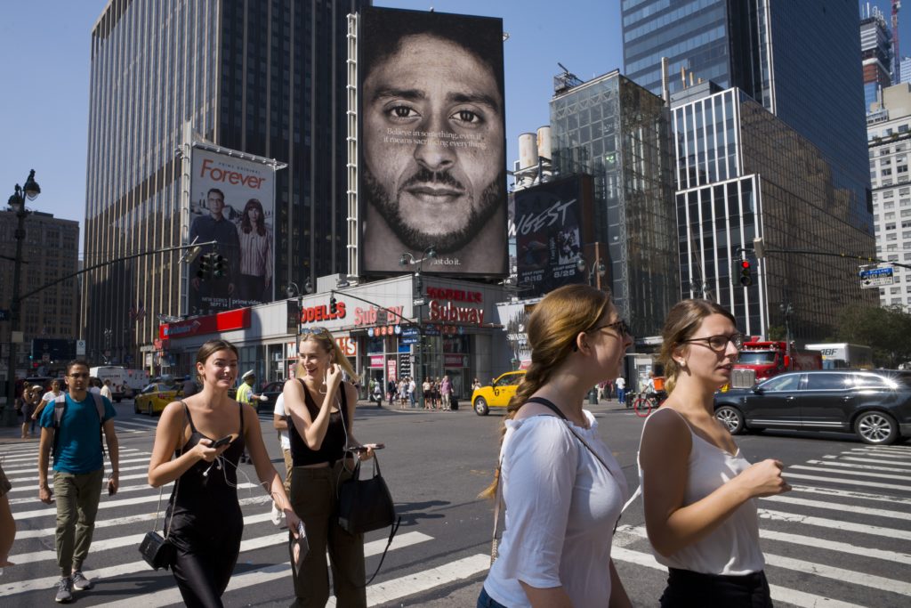 Photo of Colin Kaepernick's Nike ad on a billboard in New York