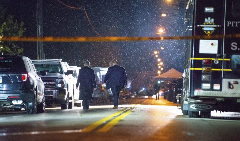 Photo of officers investigating shooting