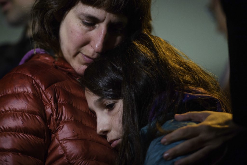 Photo of Pittsburgh residents grieving