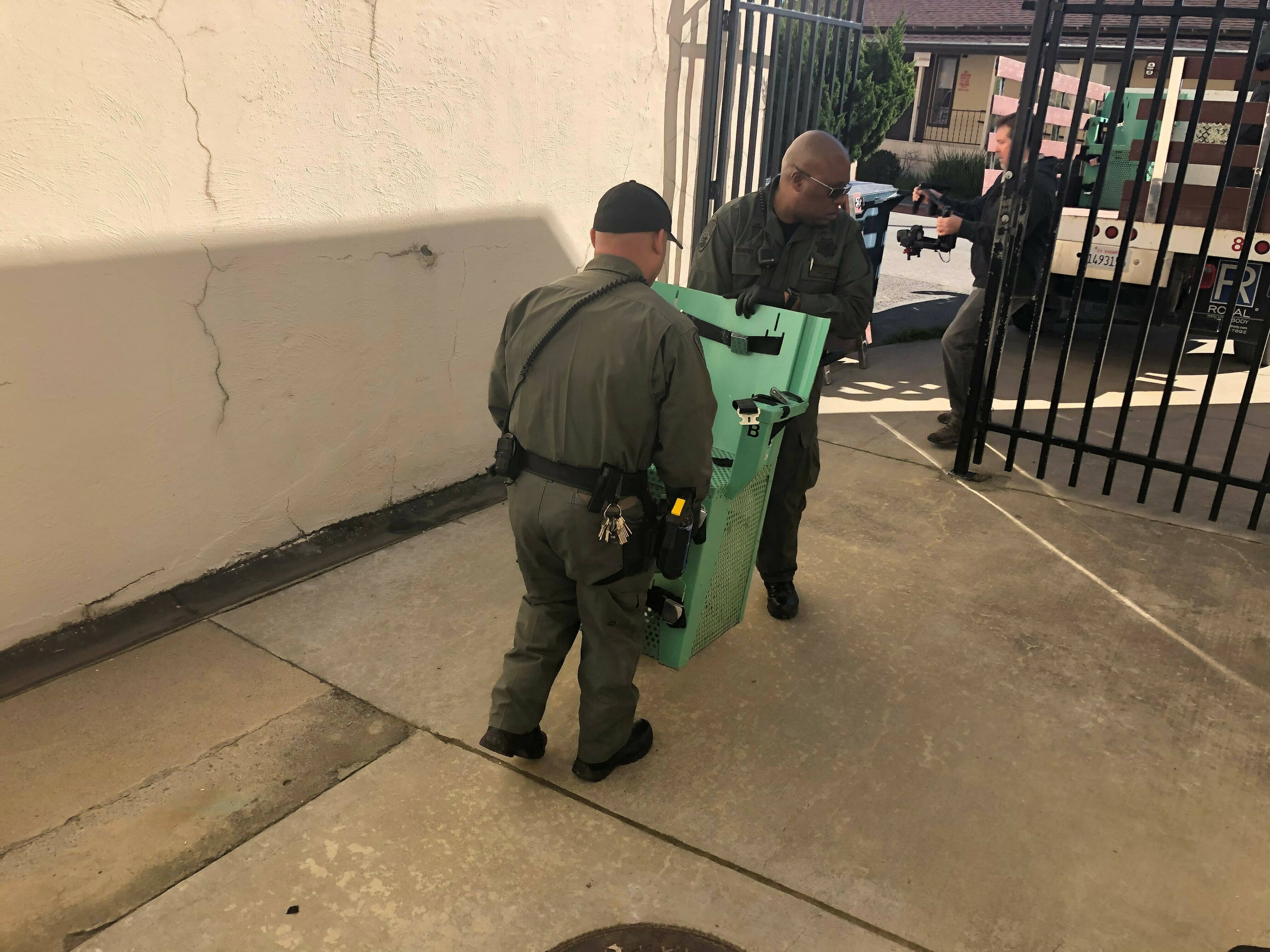 Photo of a death penalty chamber chair getting carried to a truck