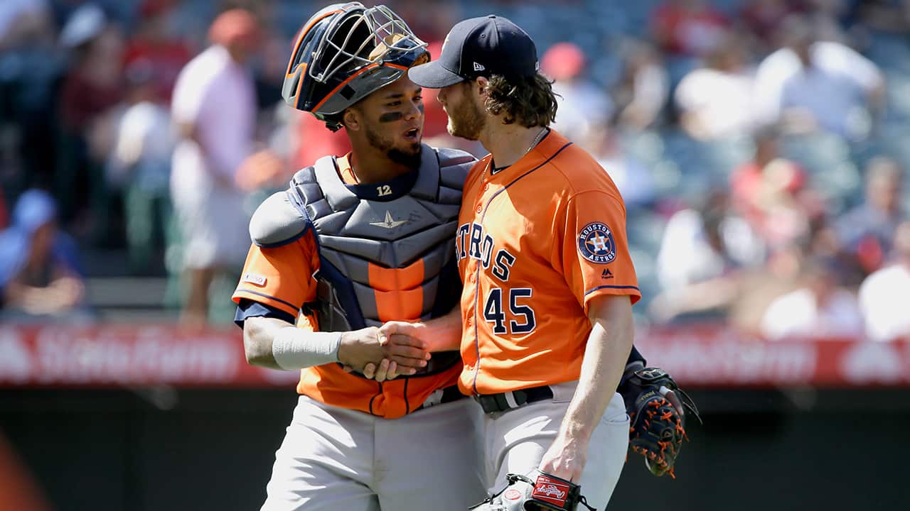 Photo of Martin Maldonado and Gerrit Cole