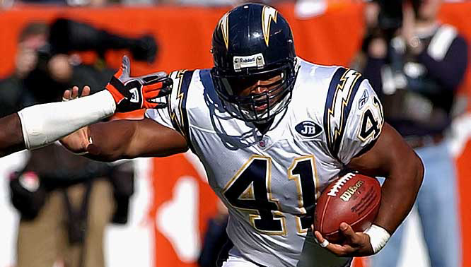 Photo of Lorenzo running with a football for the San Diego Chargers