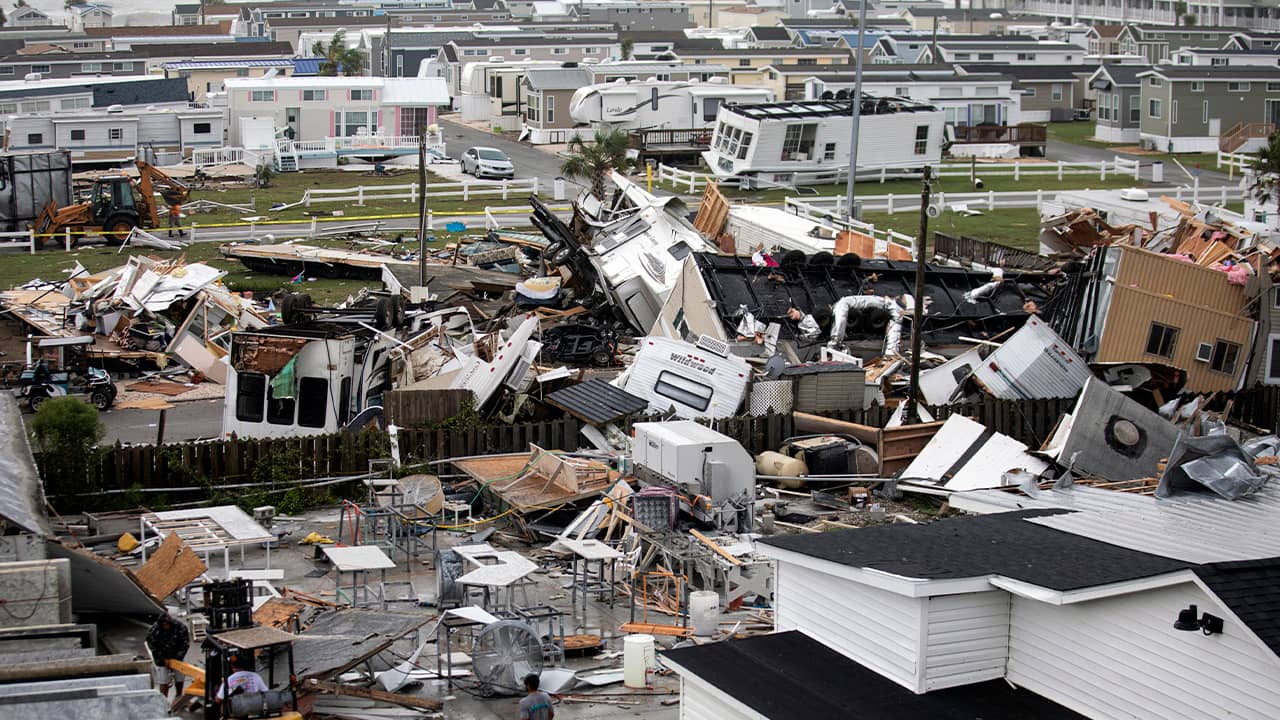 Photo of mobile homes and debris