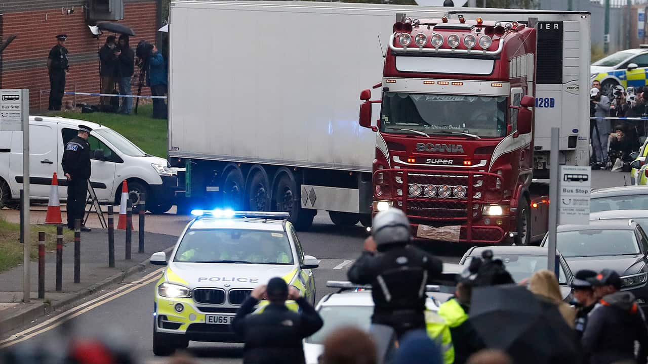 Photo of police escorting a truck