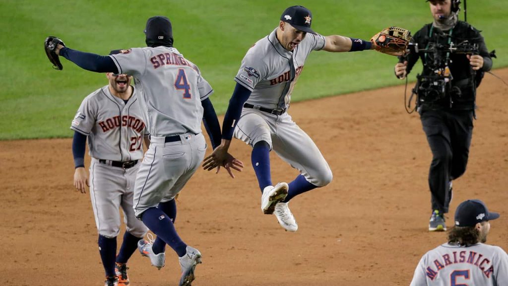 Photo of Houston Astros celebrating a victory over the New York Yankees