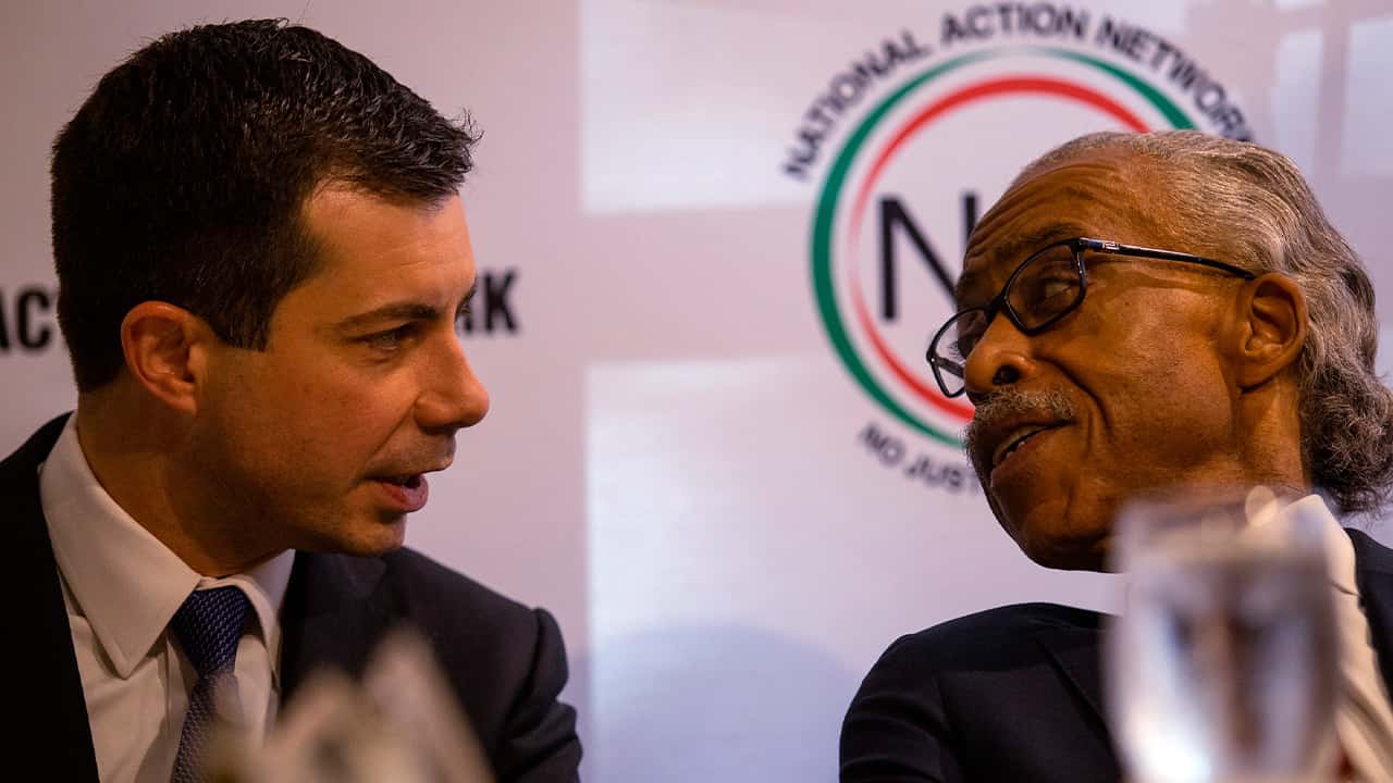 Photo of Pete Buttigieg and Rev. Al Sharpton