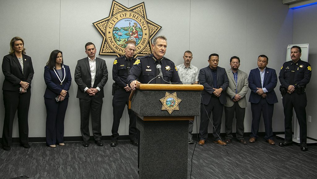 Photo of Fresno Police Chief Andrew Hall speaking at a news conference about a mass shooting