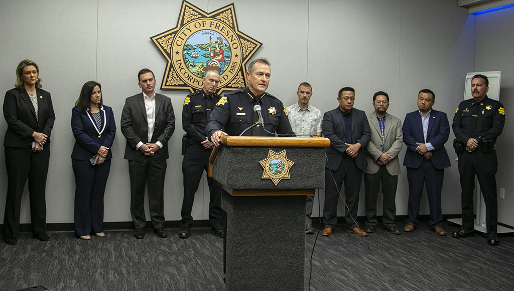 Photo of Fresno Police Chief Andrew Hall speaking at a news conference about a mass shooting
