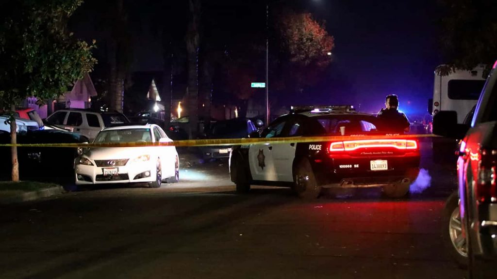 Photo of police working at the scene of the shooting
