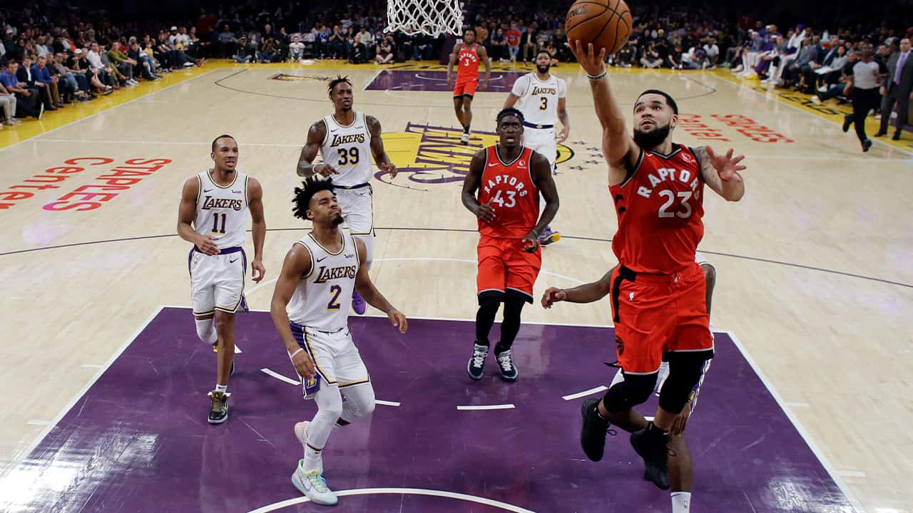 Photo of Toronto Raptors' Fred VanVleet scoring against the Los Angeles Lakers