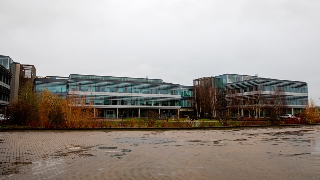 Photo of a sign at the Mundipharma International headquarters at Cambridge Science Park in England
