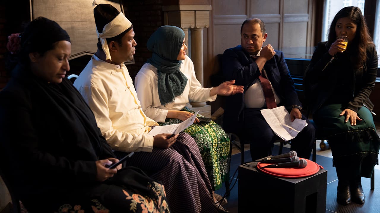 Photo of Yasmin Ullah, center, and other representatives of the Rohingya community
