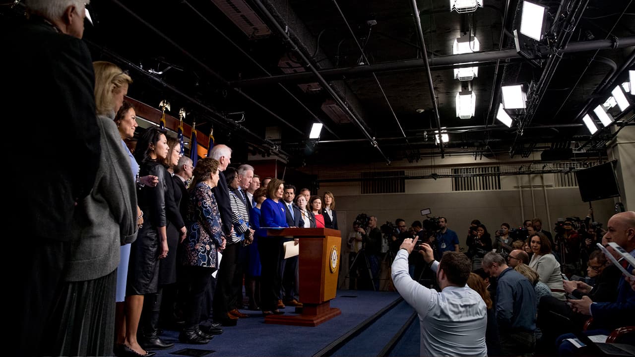 Photo of House Speaker Nancy Pelosi with House Congress members