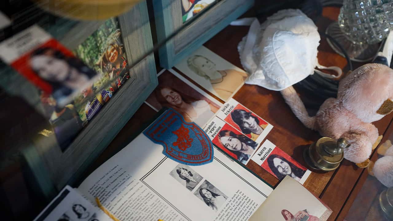 Photo of pictures of the three Finneytown students killed in a stampede at The Who's Dec. 3, 1979 concert