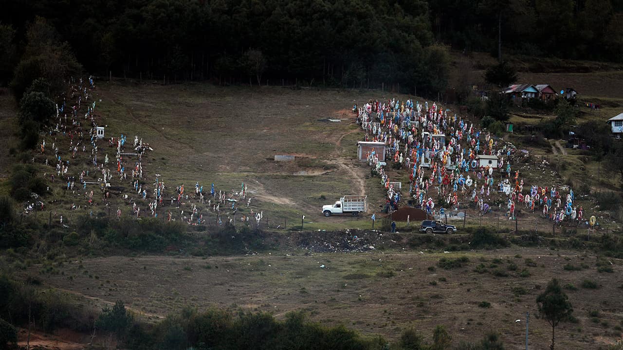 Photo of workers preparing a grave in the cemetery where environmental activist Homero Gomez Gonzalez was to be buried the following day, in Ocampo, Michoacan state, Mexico