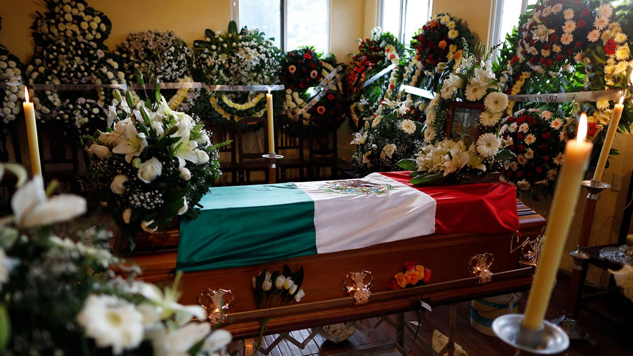 Photo of the flag-draped coffin of environmental activist Homero Gomez Gonzalez at his wake in Ocampo, Michoacan state, Mexico