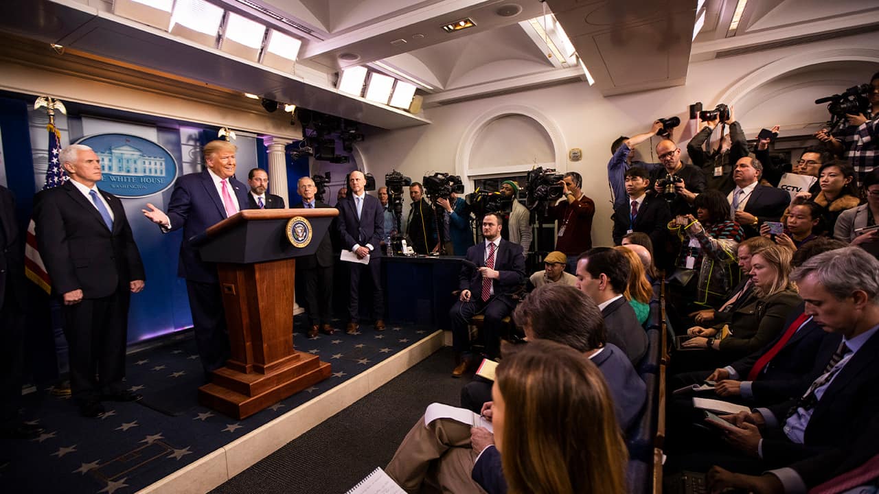 Photo of President Donald Trump with Vice President Mike Pence, left, and members of the president's coronavirus task force