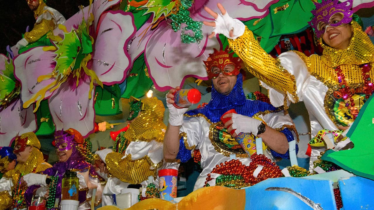 Photo of float riders throwing beads