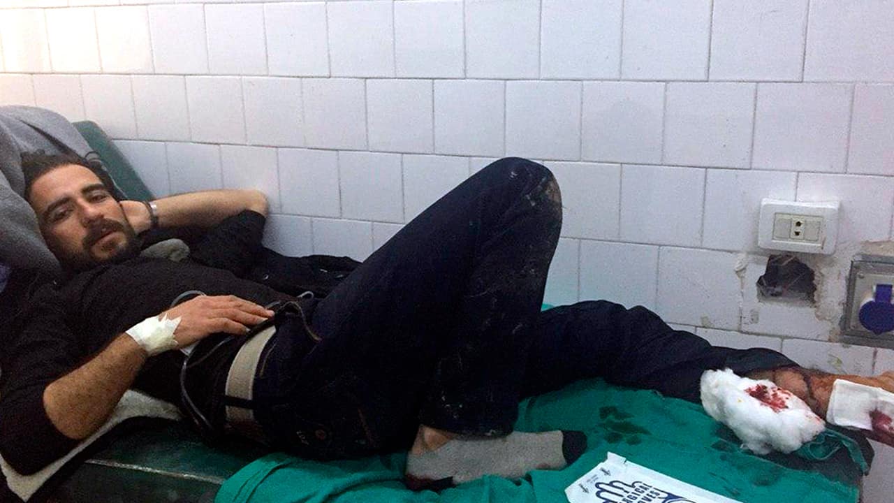 Photo of a Syrian man receiving treatment