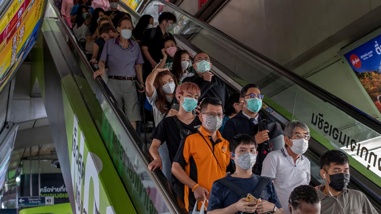 Photo of commuters wearing face masks in Thailand
