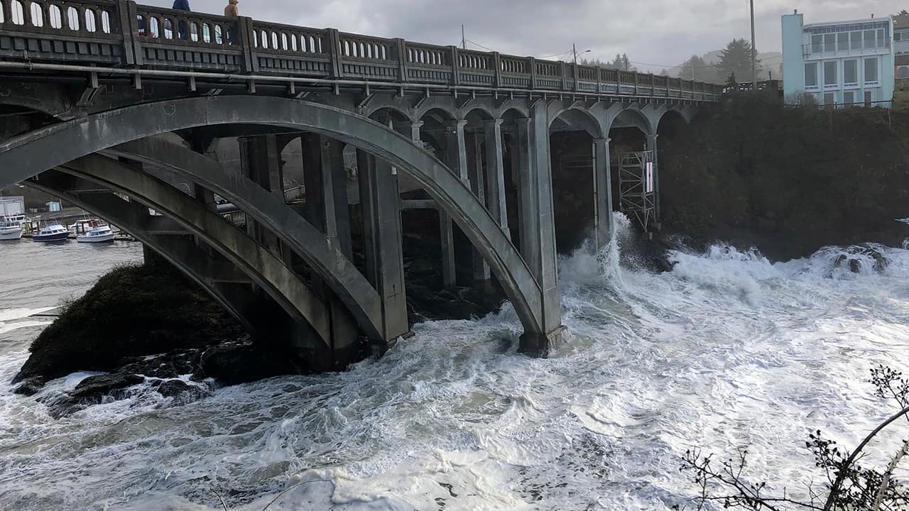 Photo of high tides rolling into the harbor in Depoe Bay, Ore.