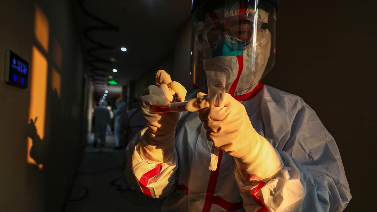 Photo of a medical worker in a protective suit