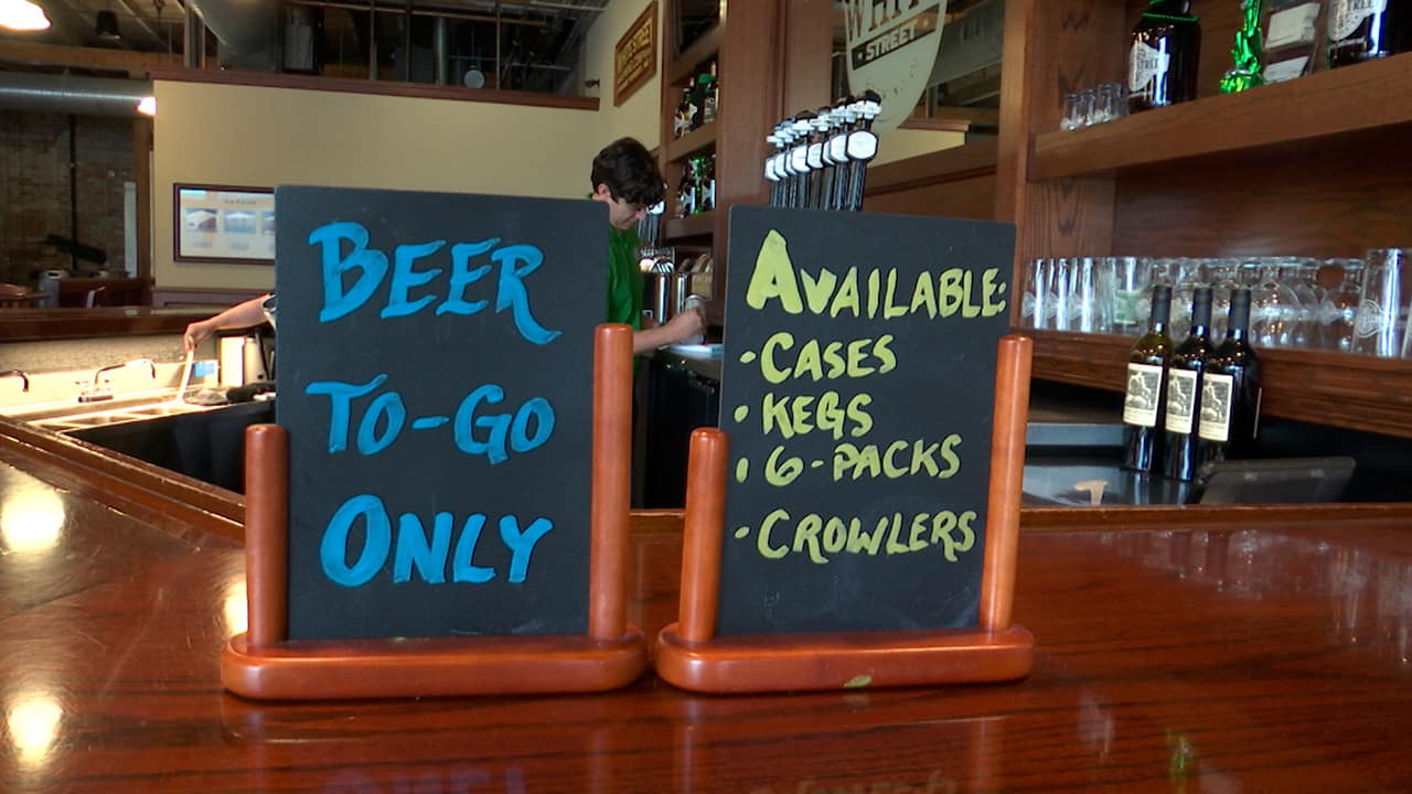 Photo of a to-go beer sign