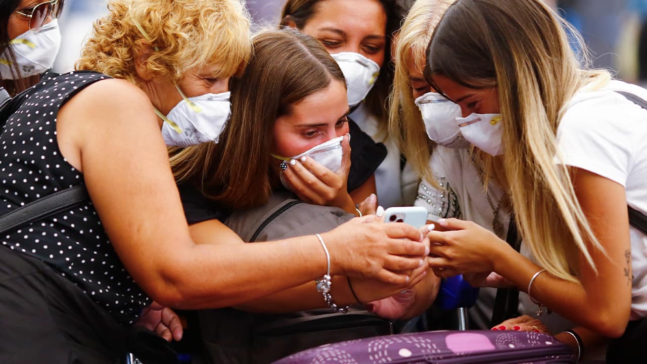 Photo of girls wearing protective masks