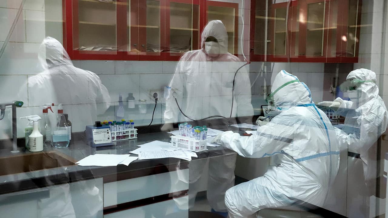 Photo of paramedics testing samples taken from patients suspected of being infected with the new coronavirus