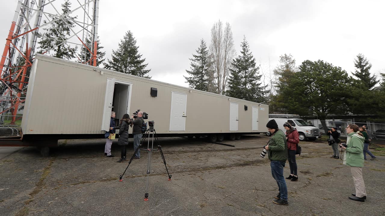 Photo of reporters in South Seattle