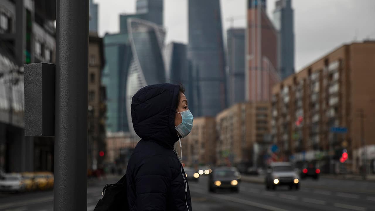 Photo of a woman wearing a face mask in Russia
