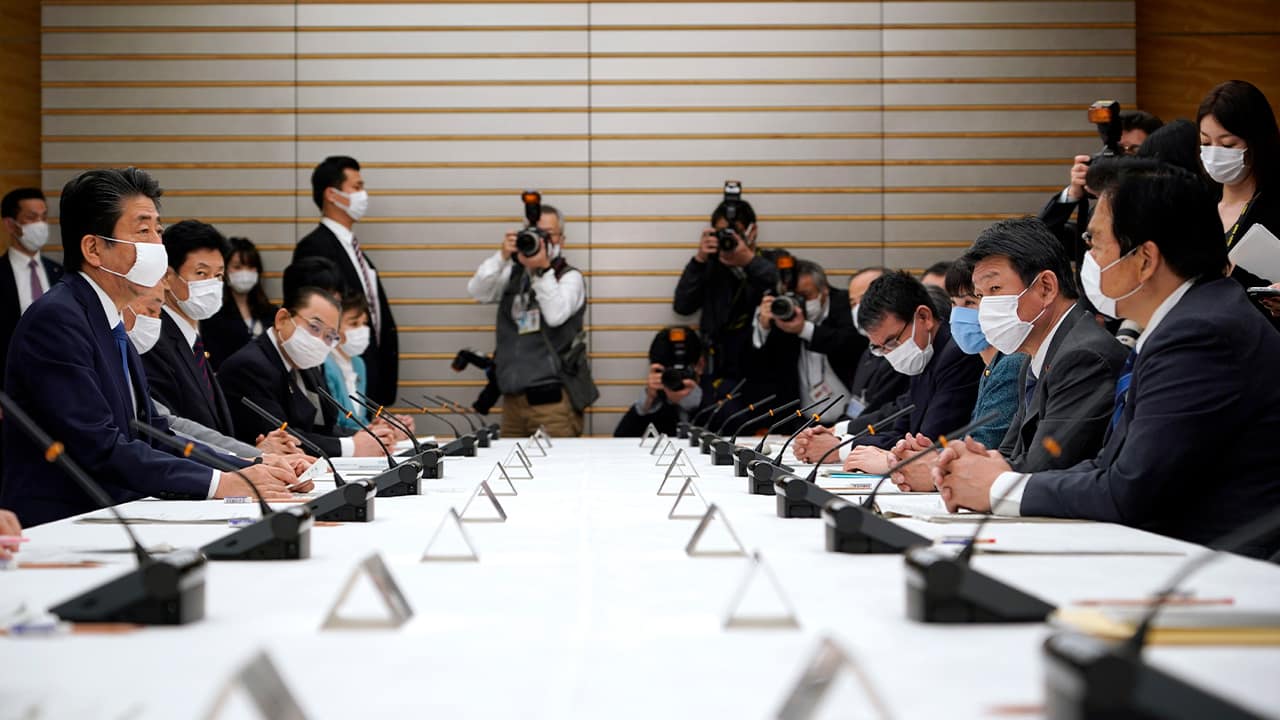 Photo of a meeting of the headquarters for measures against the coronavirus disease at the prime minister official residence in Tokyo, Japan