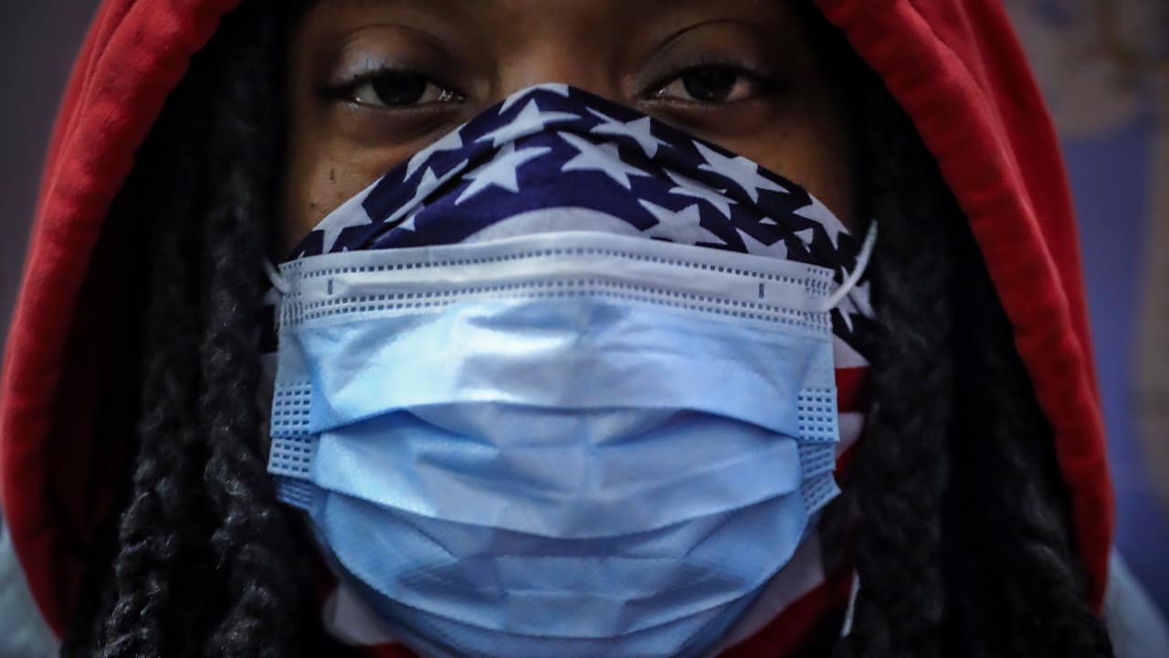 Photo of a woman wearing a face mask in New York