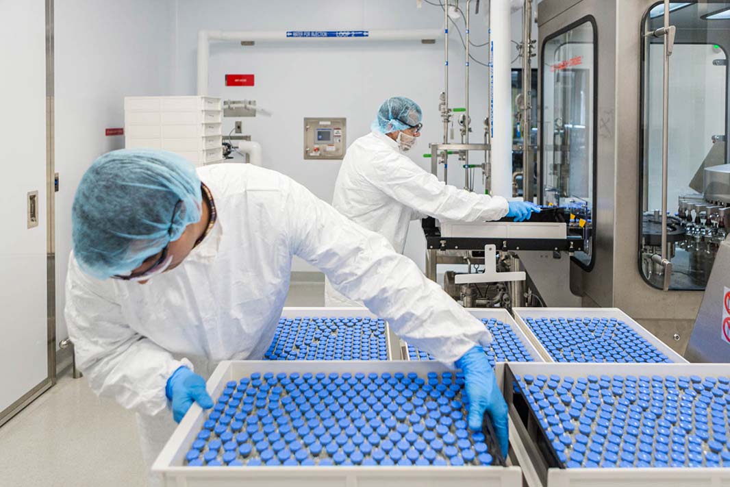 Photo of drug therapy vials being unloaded