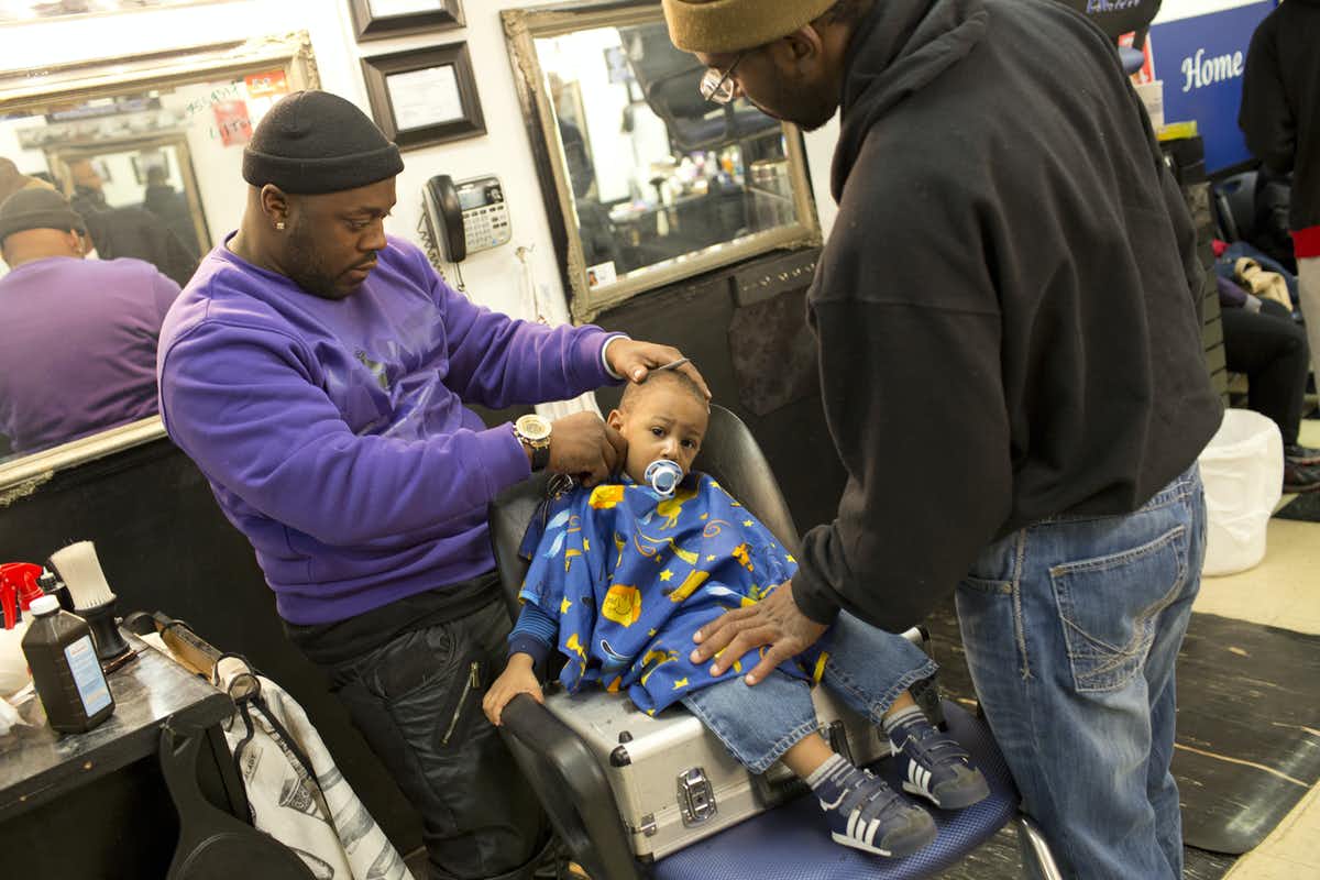 Photo of people at a barber shop