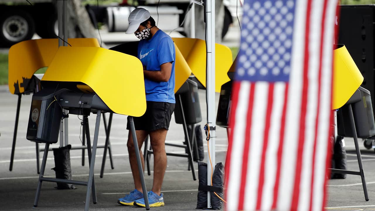 Photo of a man voting