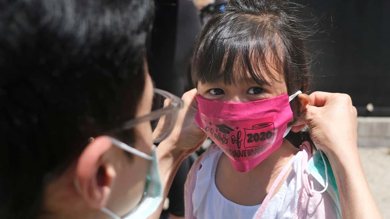 Photo of a girl wearing a mask