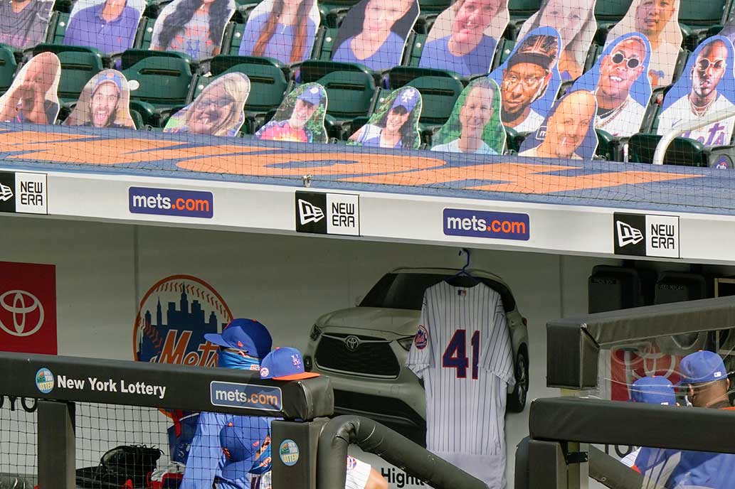 A photo of Tom Seaver's No. 41 jersey hangs in the New York Mets dugout in tribute to the Hall of Famers