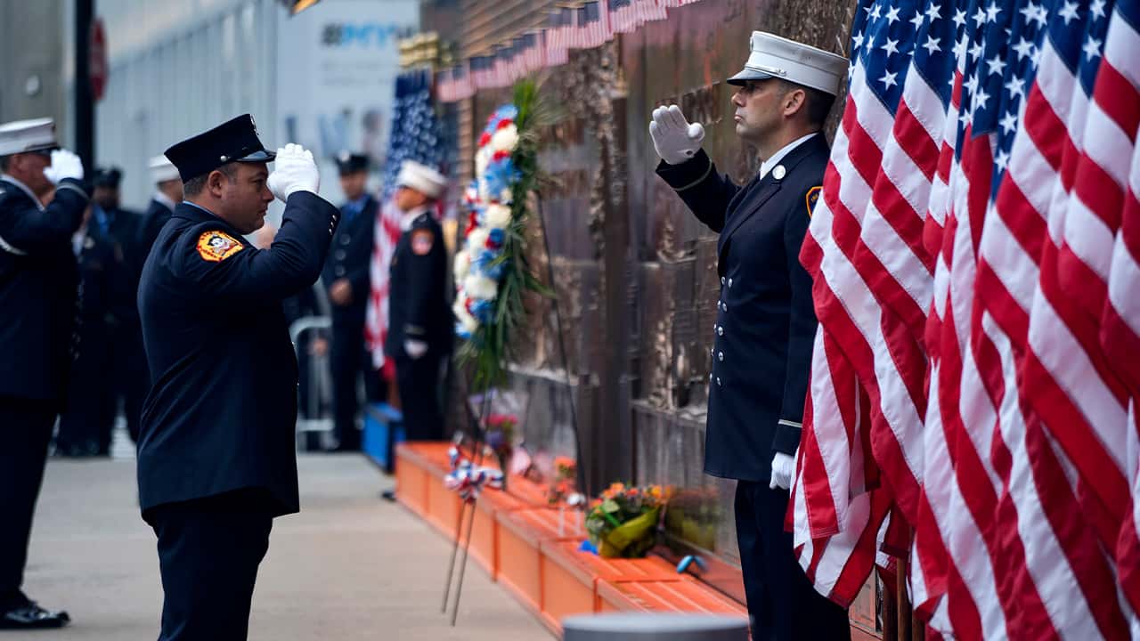 Photo of saluting New York City firefighters